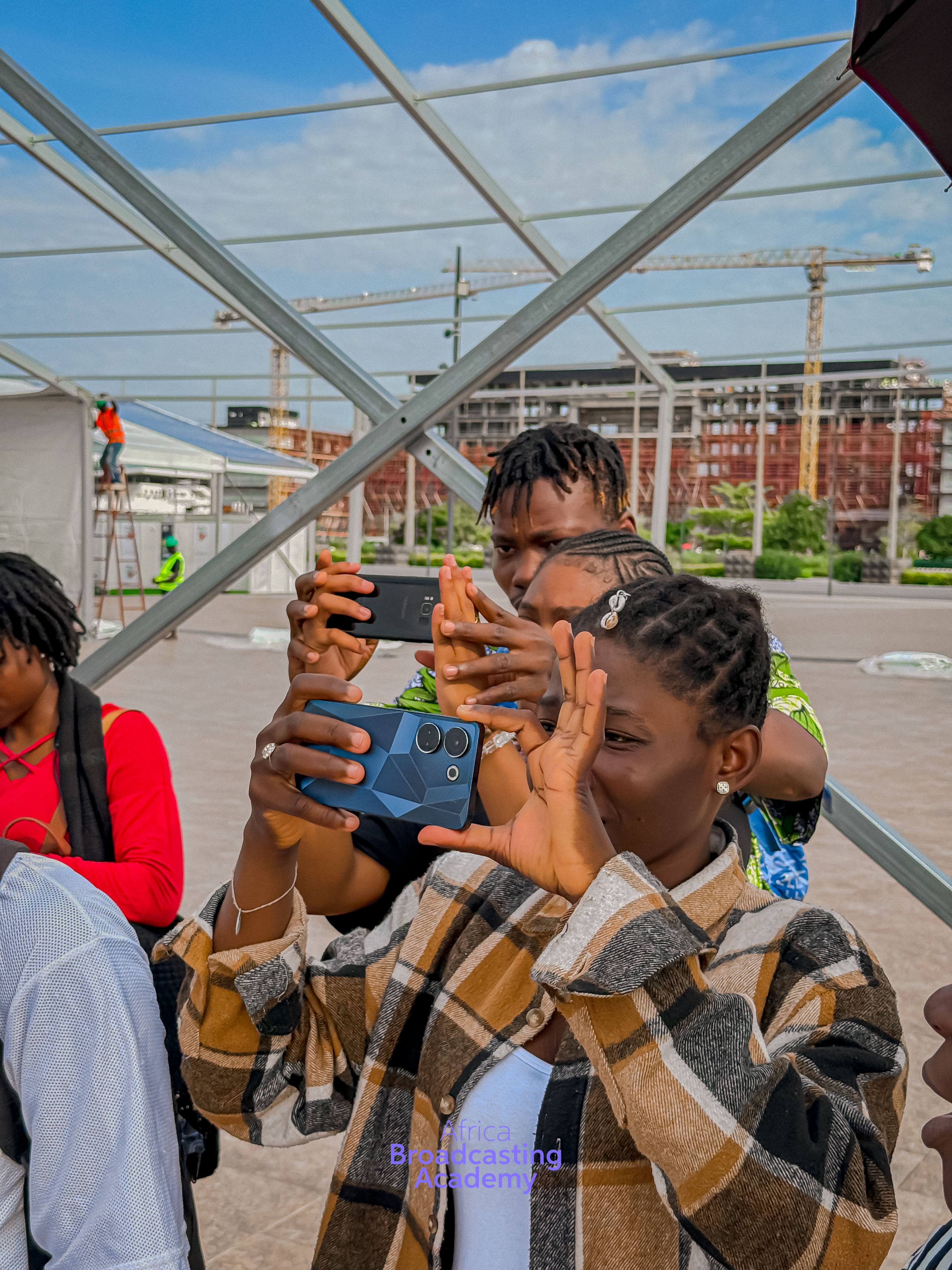 Students in 
            broadcast studio training